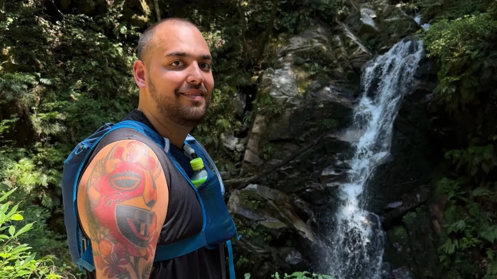 A headshot of Dr. Athanasopoulos on a nature hike